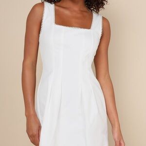 Elegant White Dress with Pearl Details